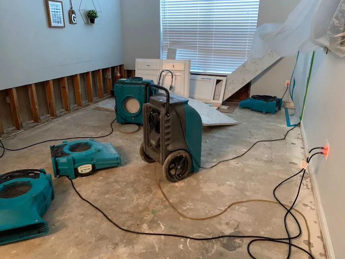 Dehumidifier in flood-cut room for Water Damage Restoration in Round Rock
